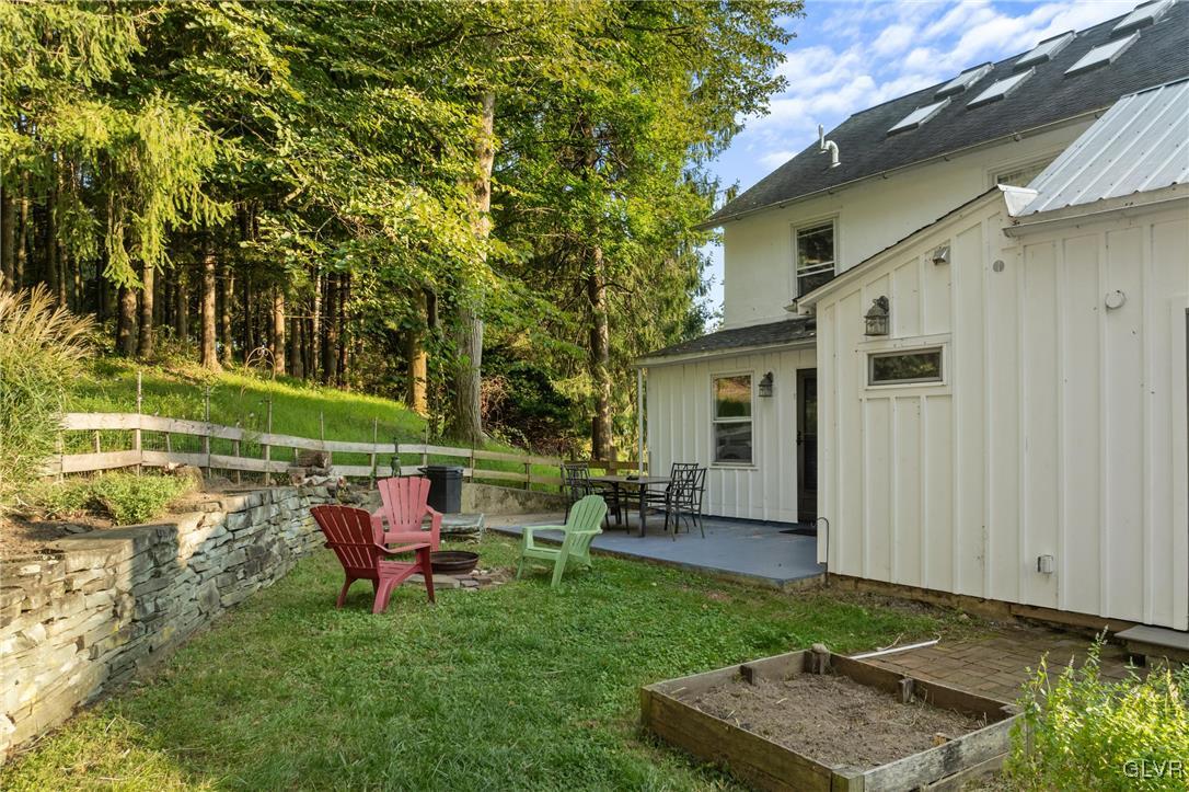 3225 Jordan Road Orefield, PA 18069 - Photo 42 of 50 a backyard of a house with outdoor seating