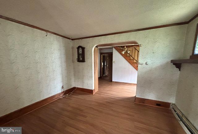 526 Manor Road Beverly, NJ 08010 - Photo 2 of 13 a view of a hallway with wooden floor