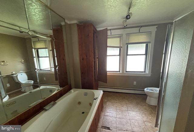 526 Manor Road Beverly, NJ 08010 - Photo 5 of 13 a bathroom with a tub sink and a mirror