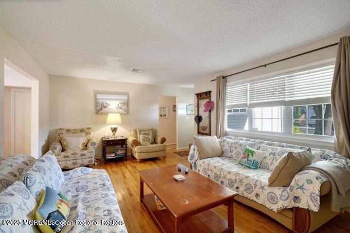 81 Berry Place Long Branch, NJ 07740 - Photo 2 of 11 a living room with furniture and a couch