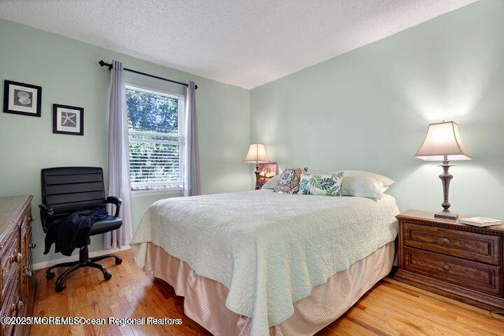 81 Berry Place Long Branch, NJ 07740 - Photo 6 of 11 a bedroom with bed and a window