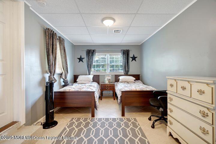 81 Berry Place Long Branch, NJ 07740 - Photo 9 of 11 a bedroom with bed and a window