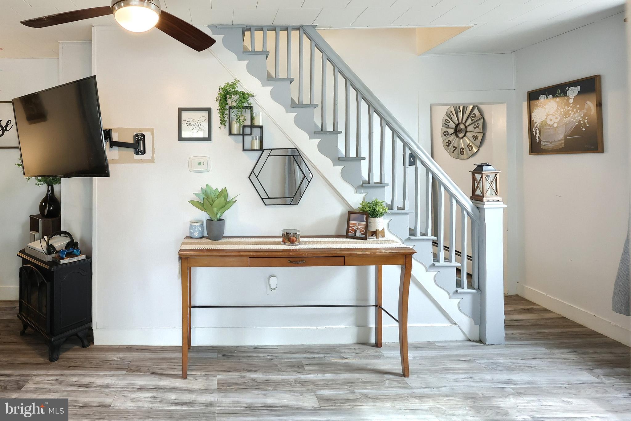 416 South High Street Hanover, PA 17331 - Photo 15 of 37 a view of entryway and hall with wooden floor