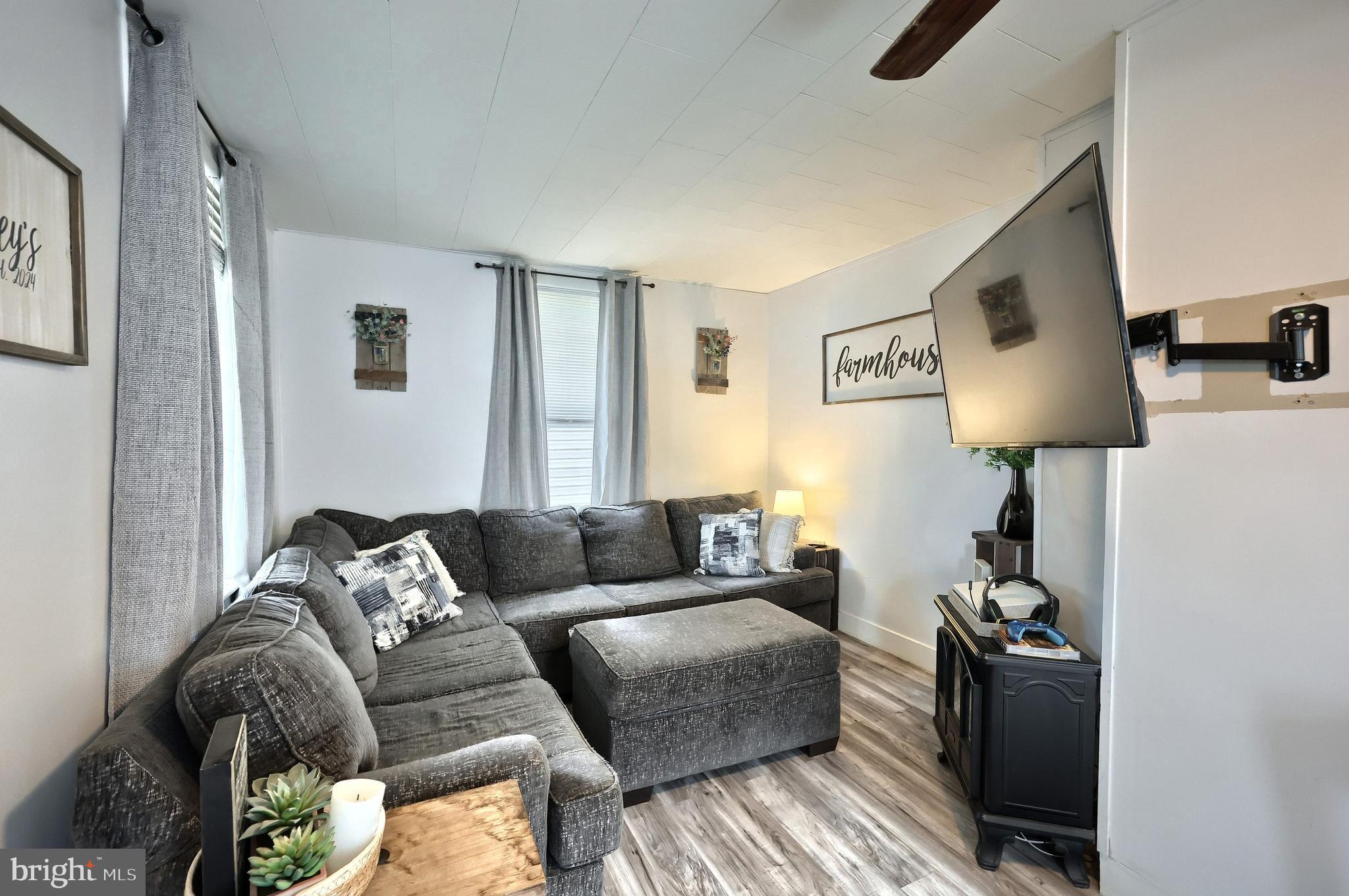 416 South High Street Hanover, PA 17331 - Photo 16 of 37 a living room with furniture and a lamp
