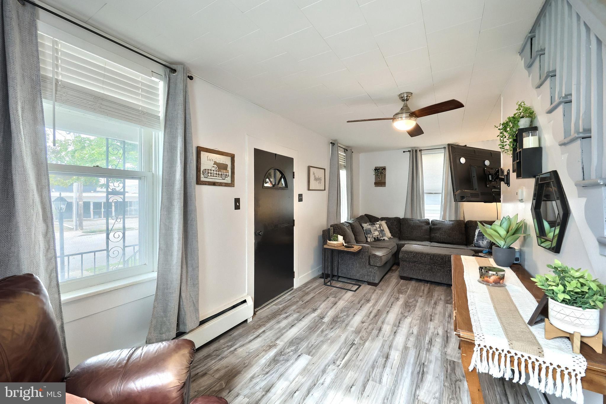 416 South High Street Hanover, PA 17331 - Photo 18 of 37 a living room with furniture and wooden floor