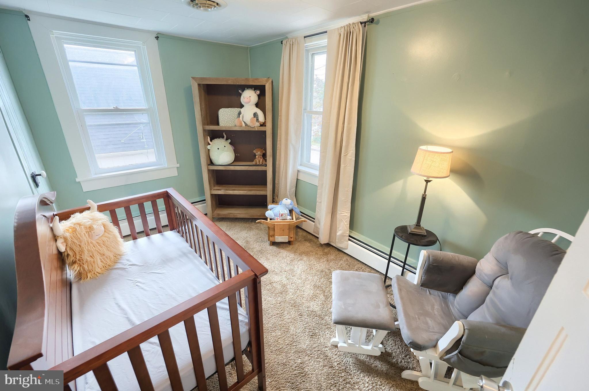 416 South High Street Hanover, PA 17331 - Photo 27 of 37 a bedroom with furniture and a window