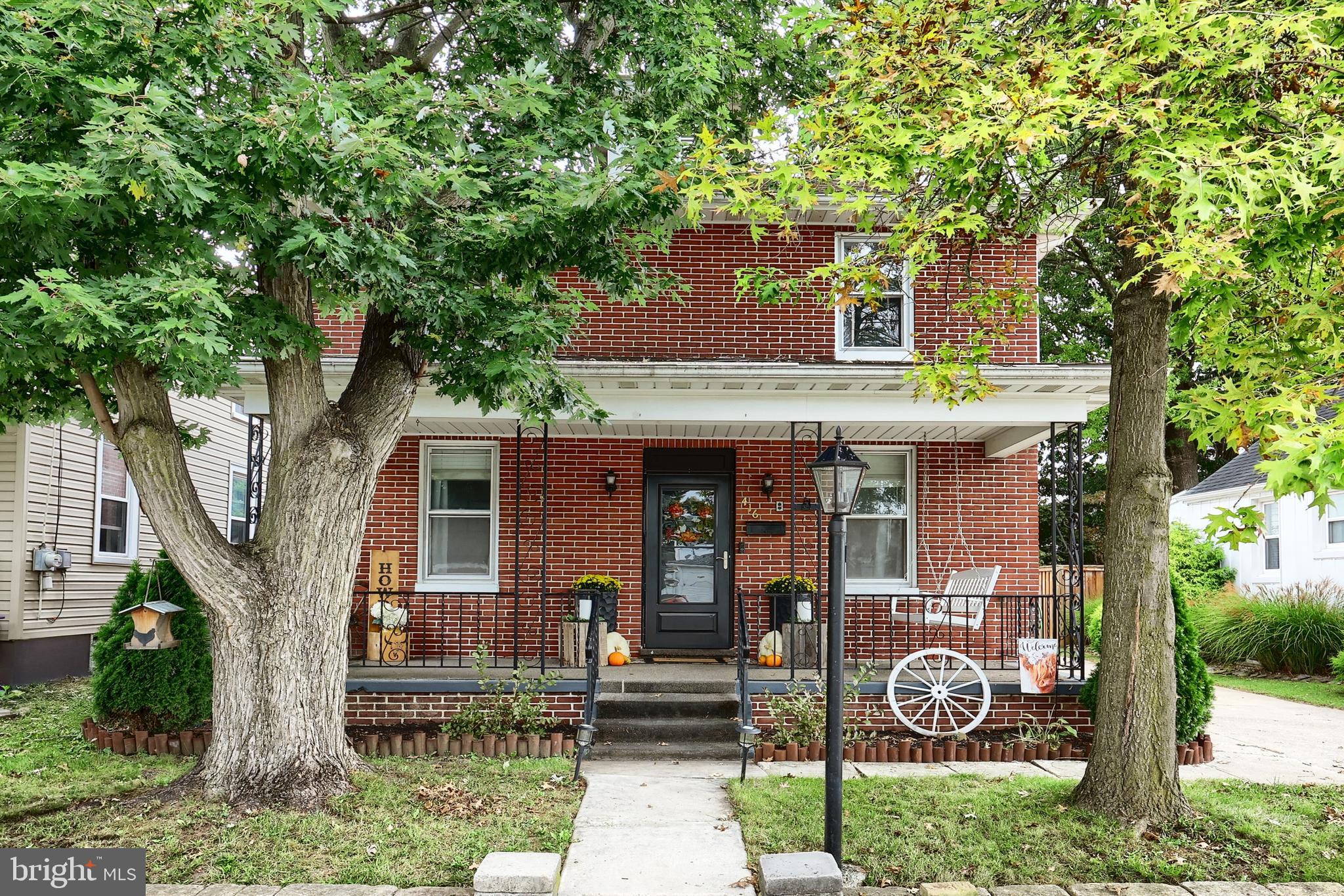 416 South High Street Hanover, PA 17331 - Photo 3 of 37 a front view of a house with garden