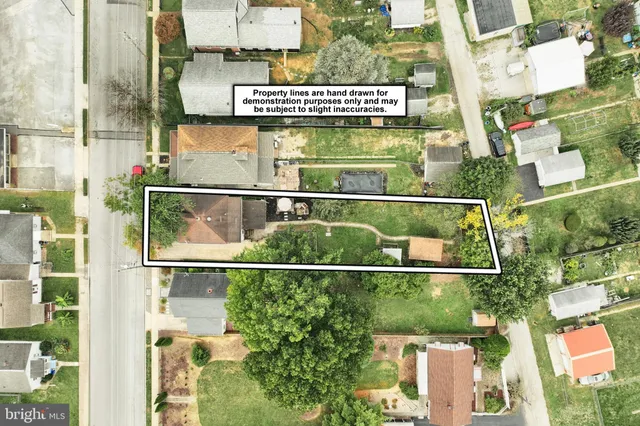 a black and white photo of a bench