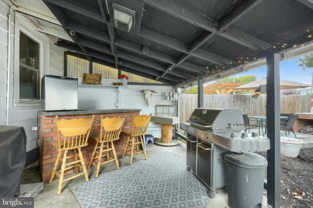 a view of a room with wooden furniture