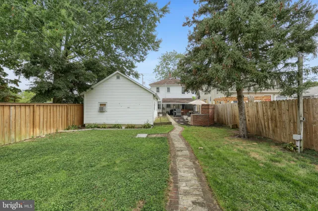 a view of a backyard of house