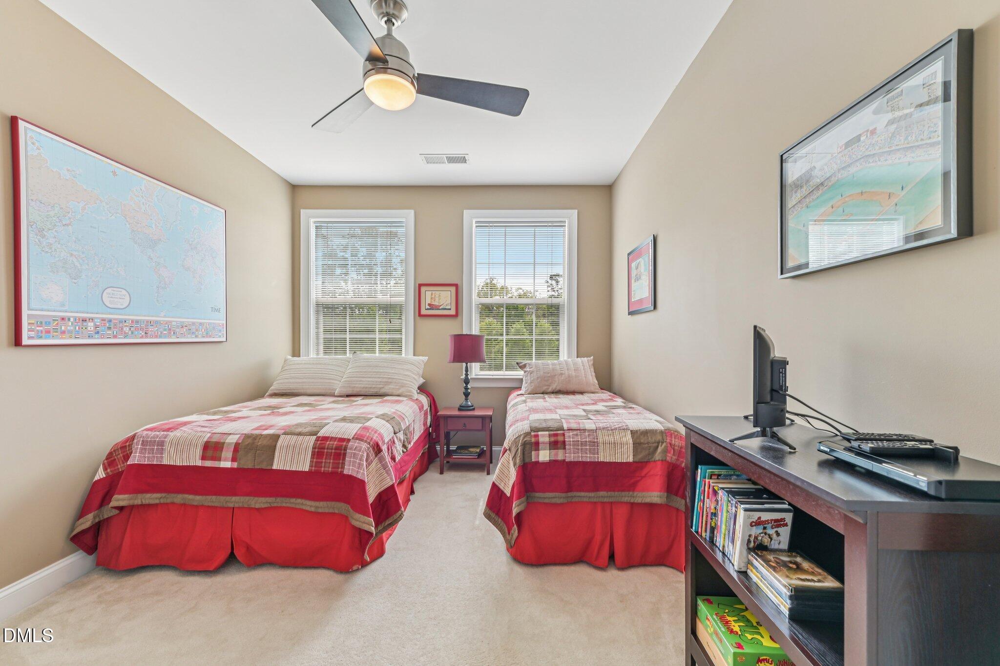 10411 Rosegate Court, Unit 205 Raleigh, NC 27617 - Photo 11 of 38 a bedroom with bed and a window