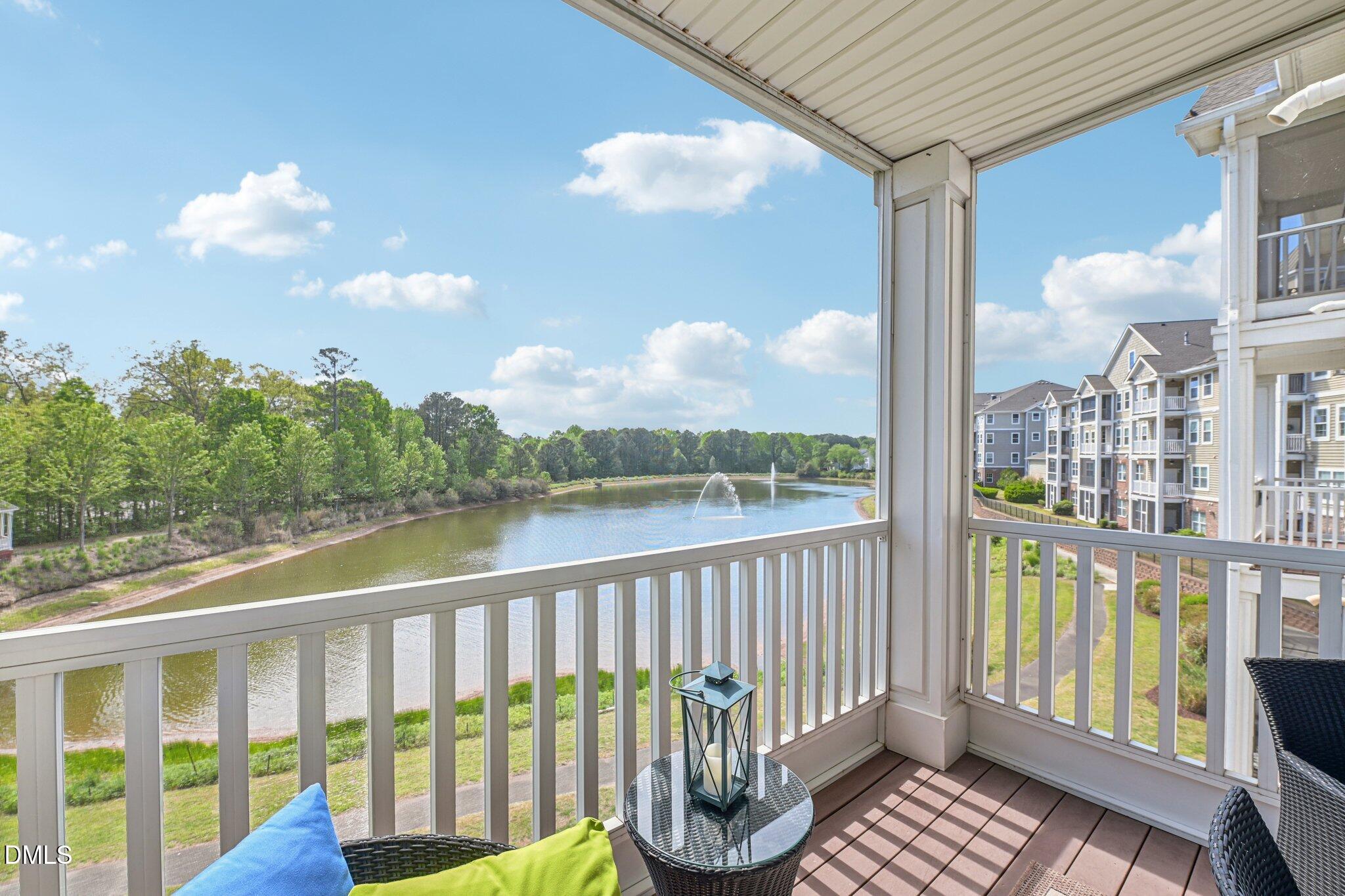 10411 Rosegate Court, Unit 205 Raleigh, NC 27617 - Photo 25 of 38 a view of a balcony with wooden floor