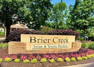 10411 Rosegate Court, Unit 205 Raleigh, NC 27617 - Photo 29 of 38 a sign on the side of the road