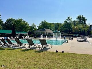 10411 Rosegate Court, Unit 205 Raleigh, NC 27617 - Photo 32 of 38 a view of a swimming pool with a patio