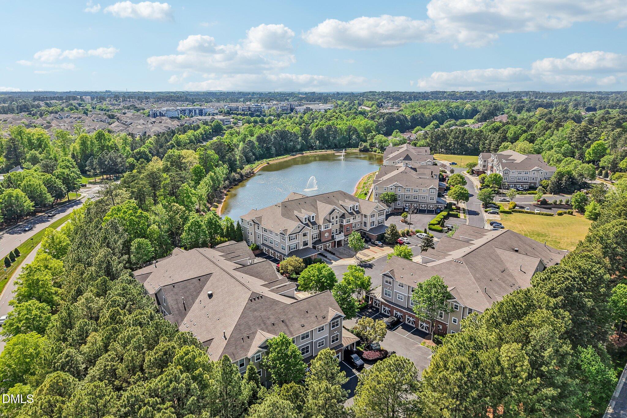 10411 Rosegate Court, Unit 205 Raleigh, NC 27617 - Photo 38 of 38 an aerial view of a house with a lake view
