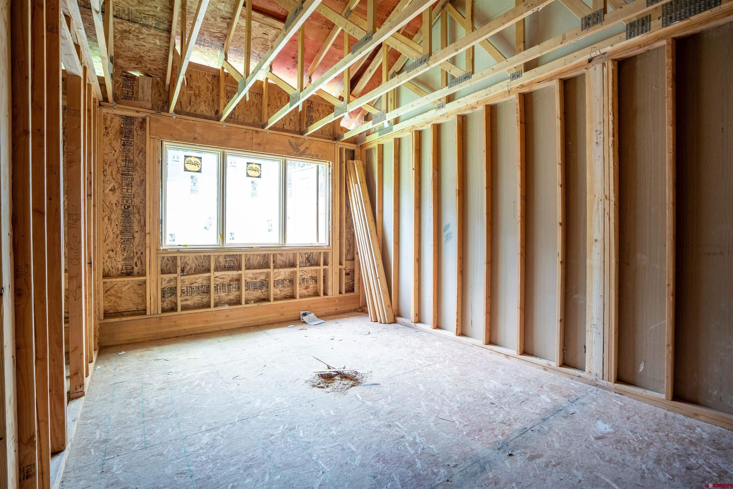 91 Travertine Trail Durango, CO 81301 - Photo 19 of 27 a view of an empty room with a window