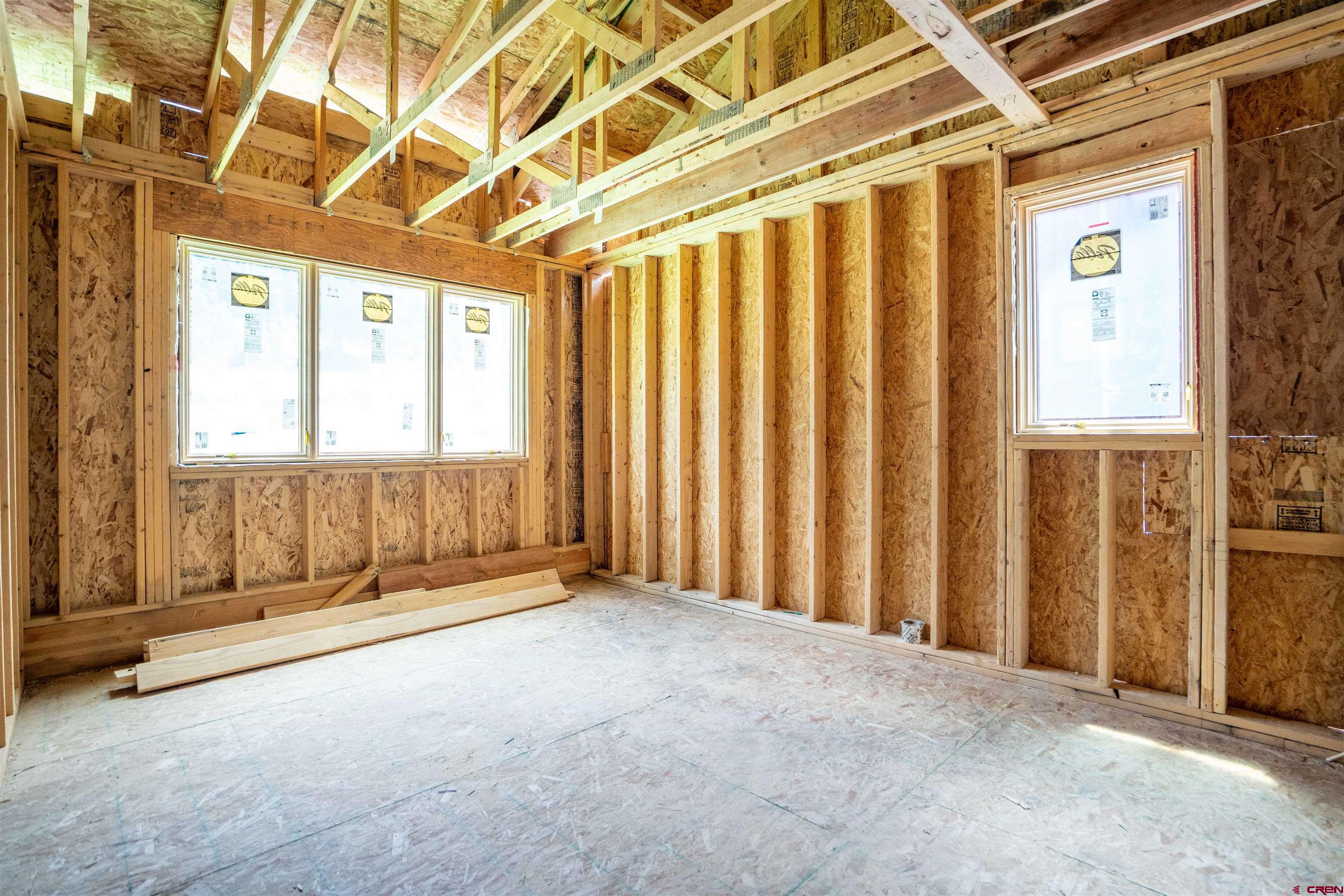 91 Travertine Trail Durango, CO 81301 - Photo 22 of 27 a view of an empty room with a window