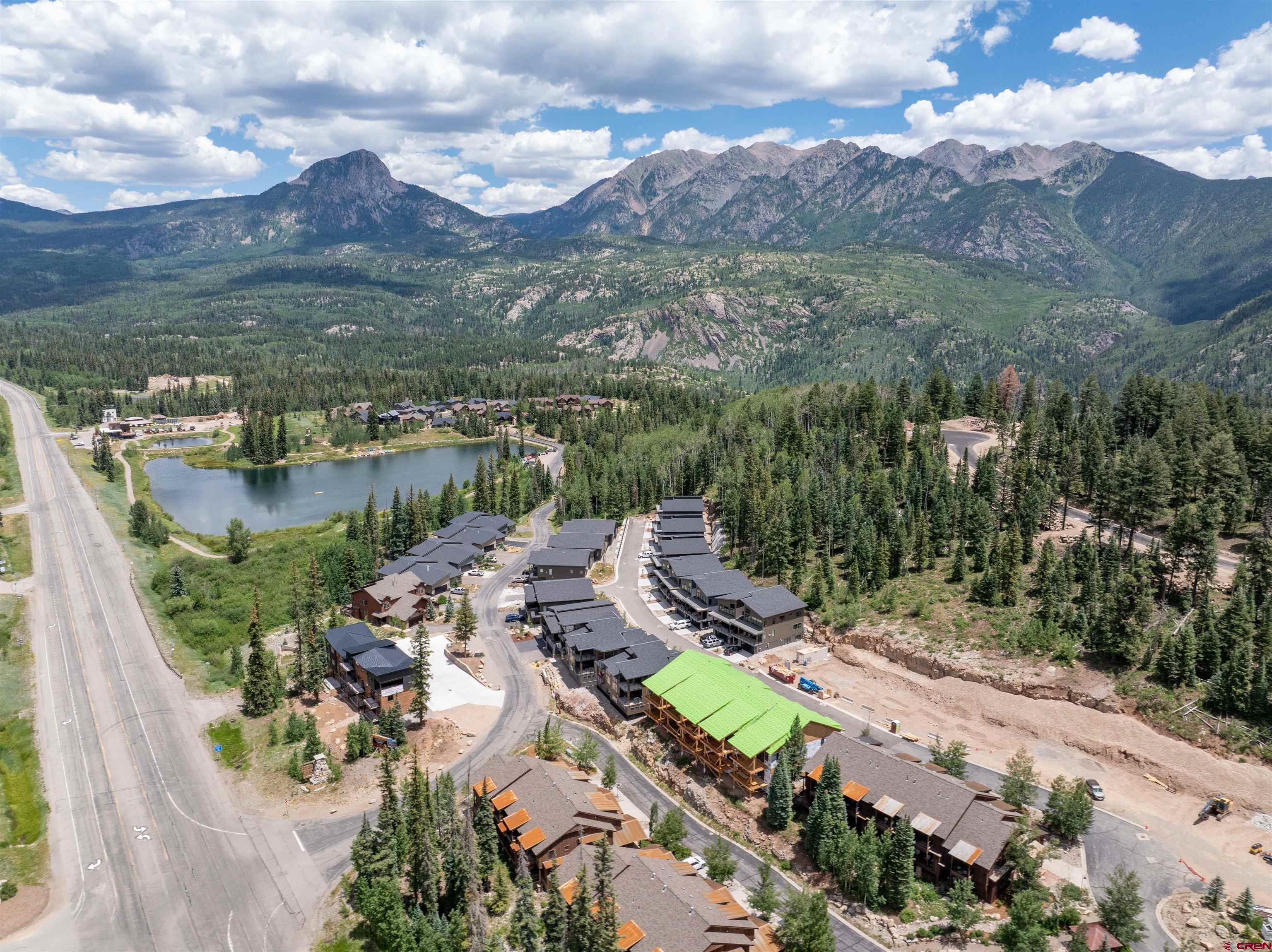 91 Travertine Trail Durango, CO 81301 - Photo 7 of 27 an aerial view of lake residential house with swimming pool and green space