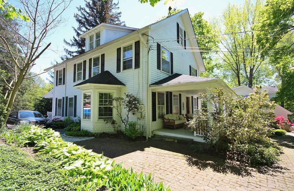 68 Croton Dam Road Ossining, NY 10562 - Photo 1 of 1 a front view of a house with a yard and trees