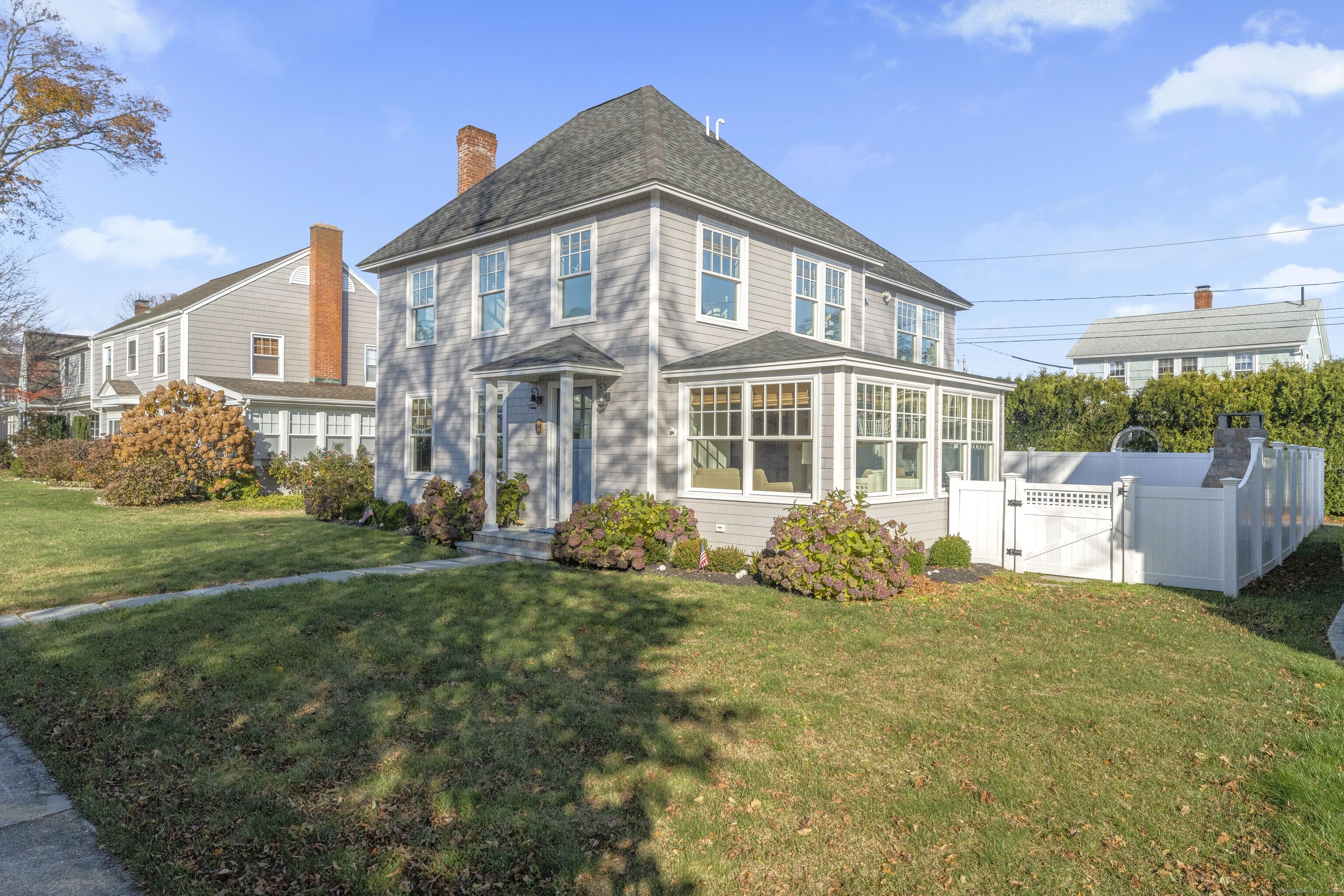 16 E Walk Clinton, CT 06413 - Photo 1 of 1 a house view with a garden space