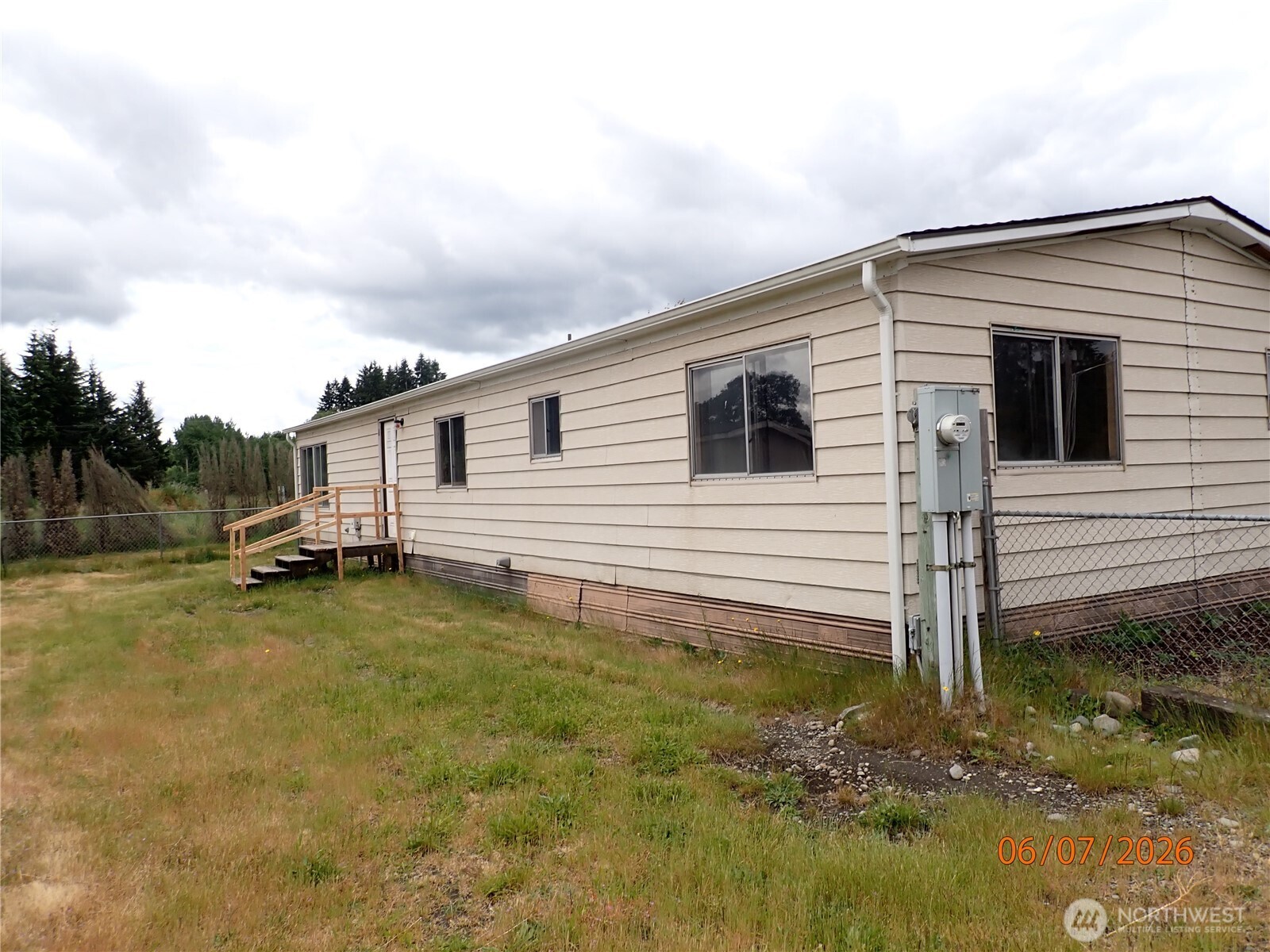 9217 183rd Avenue Southwest Rochester, WA 98579 - Photo 9 of 26 a backyard of a house