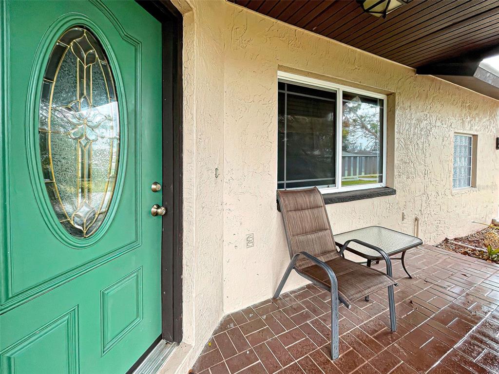 3187 Galiot Road Venice, FL 34293 - Photo 3 of 46 a view of a house with a chairs and a mirror