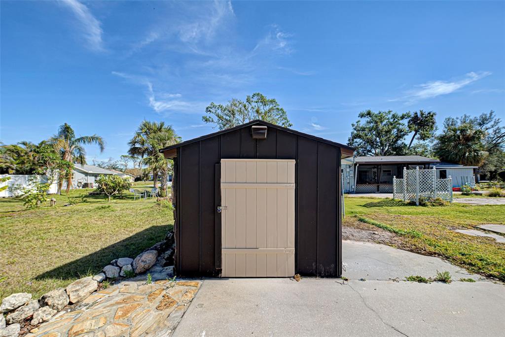 3187 Galiot Road Venice, FL 34293 - Photo 44 of 46 a front view of a house with a yard