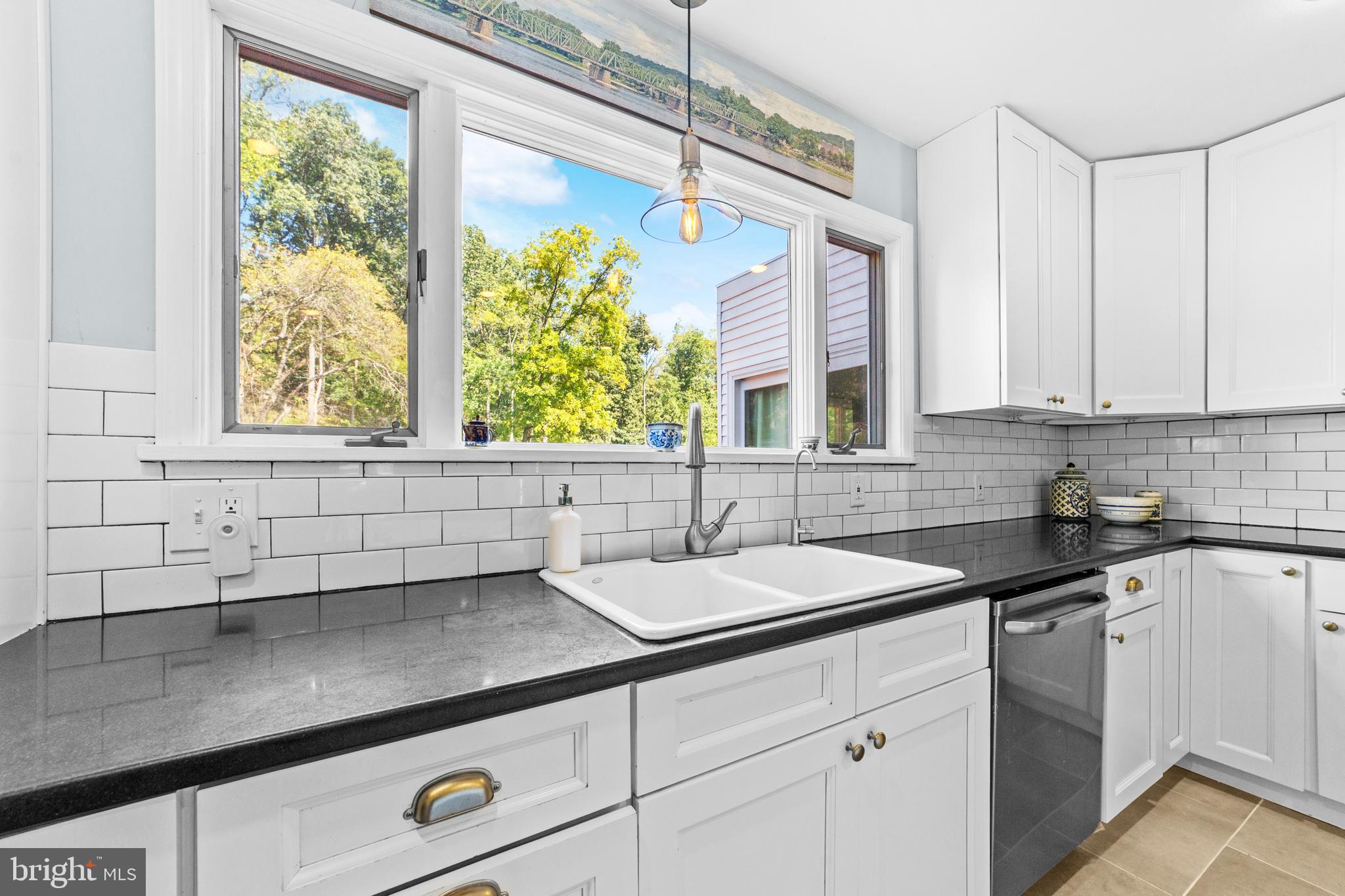72 Poor Farm Road Pennington, NJ 08534 - Photo 12 of 38 a kitchen with a sink and a window