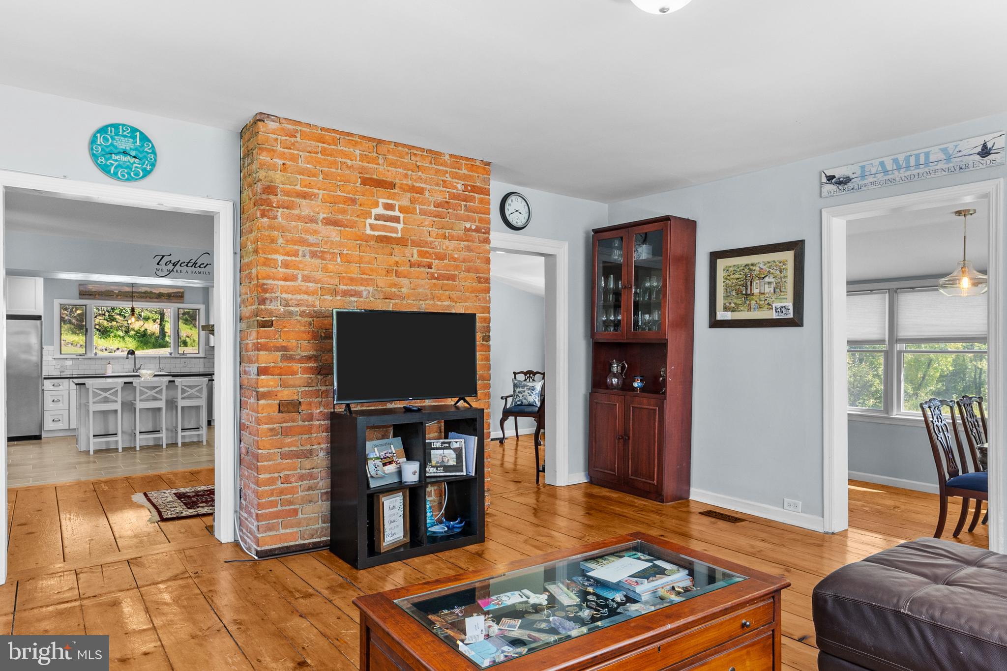 72 Poor Farm Road Pennington, NJ 08534 - Photo 19 of 38 a living room with furniture and a flat screen tv