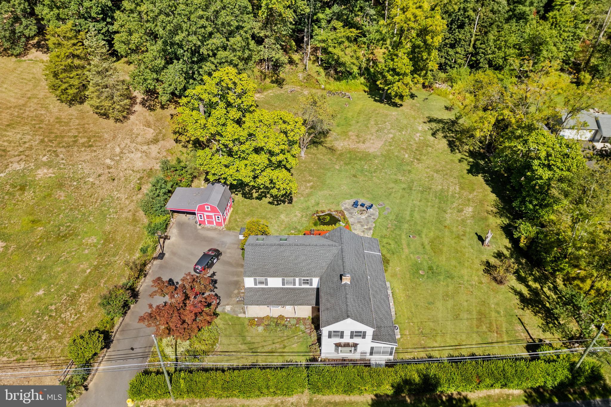 72 Poor Farm Road Pennington, NJ 08534 - Photo 3 of 38 an aerial view of residential house with outdoor space