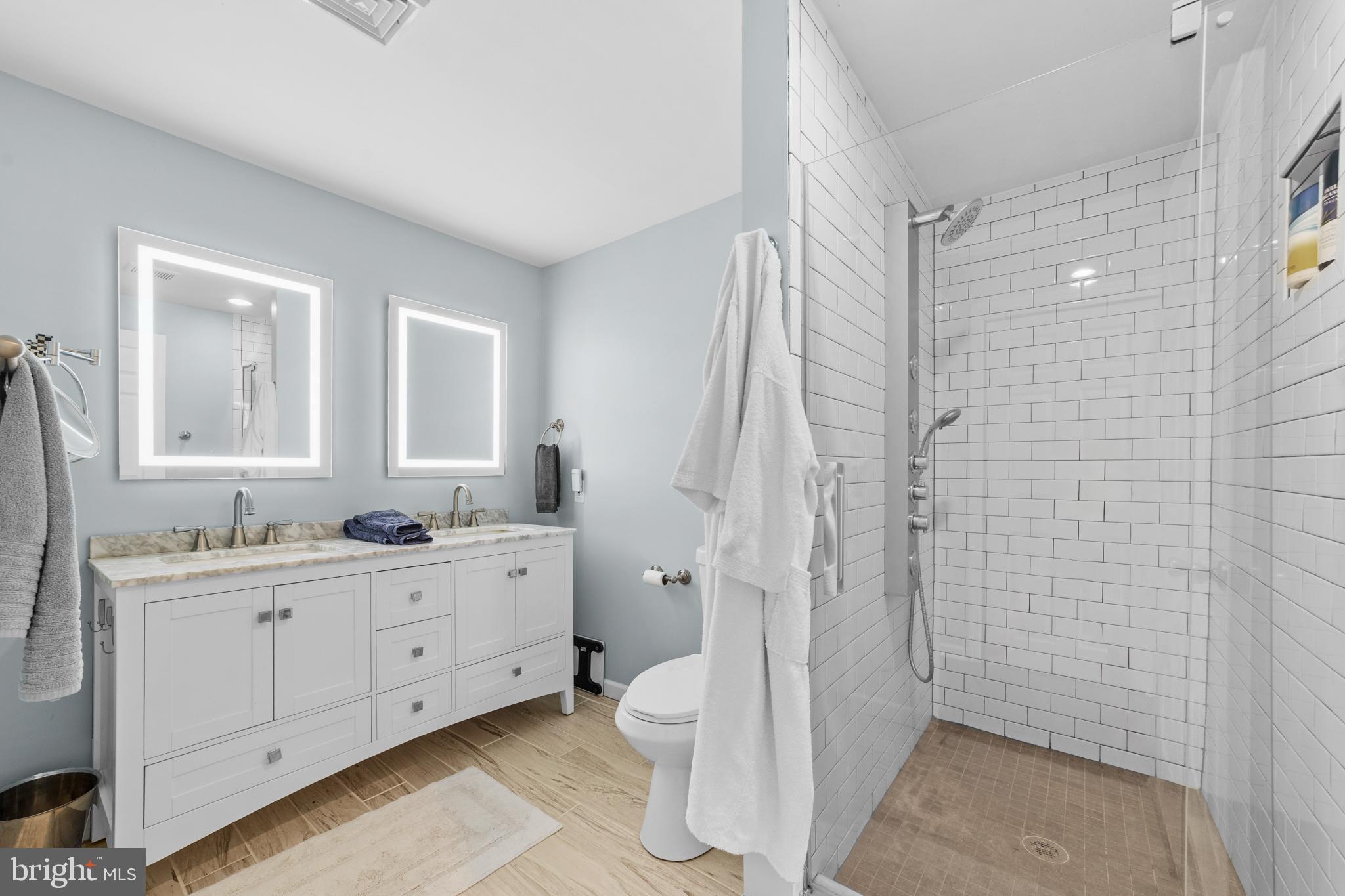 72 Poor Farm Road Pennington, NJ 08534 - Photo 32 of 38 a bathroom with a double vanity sink toilet and shower