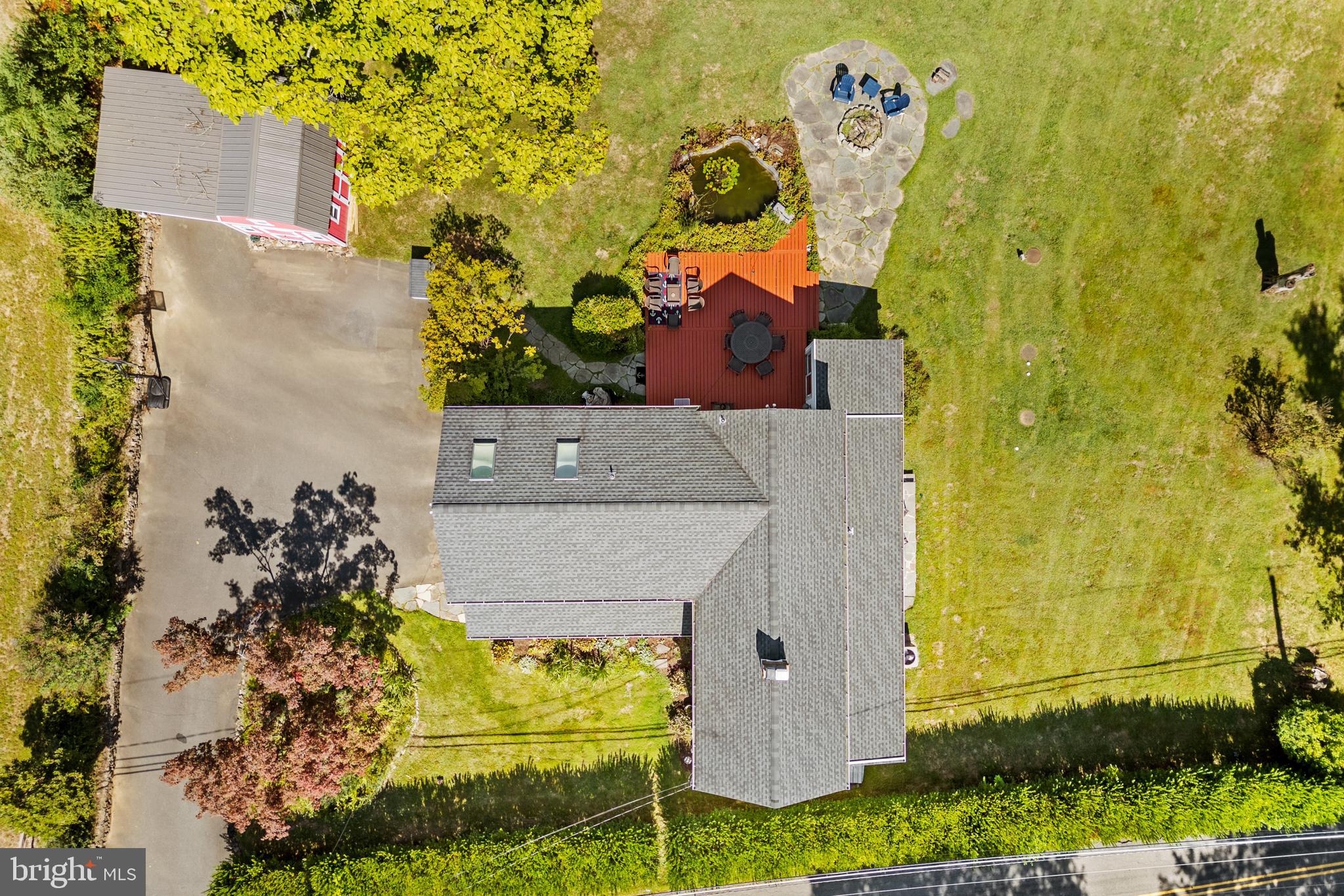 72 Poor Farm Road Pennington, NJ 08534 - Photo 6 of 38 an aerial view of a house with a yard