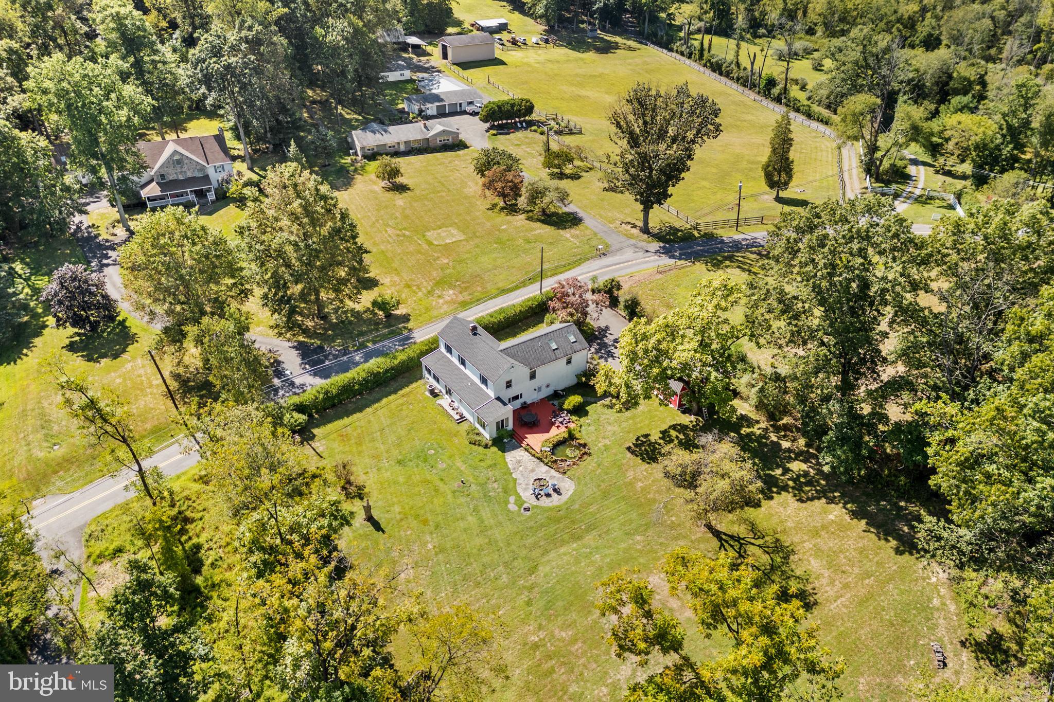 72 Poor Farm Road Pennington, NJ 08534 - Photo 7 of 38 an aerial view of residential houses with outdoor space