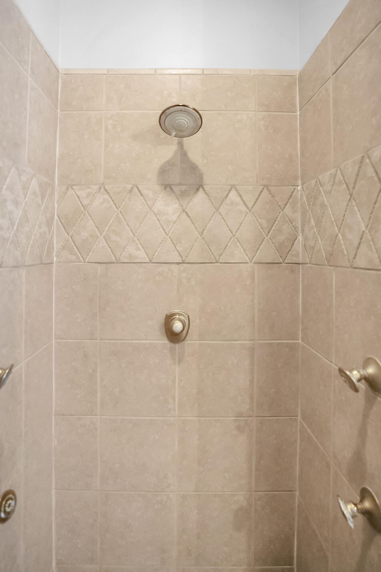 4372 Stonebridge Road Destin, FL 32541 - Photo 32 of 83 a bathroom with a shower