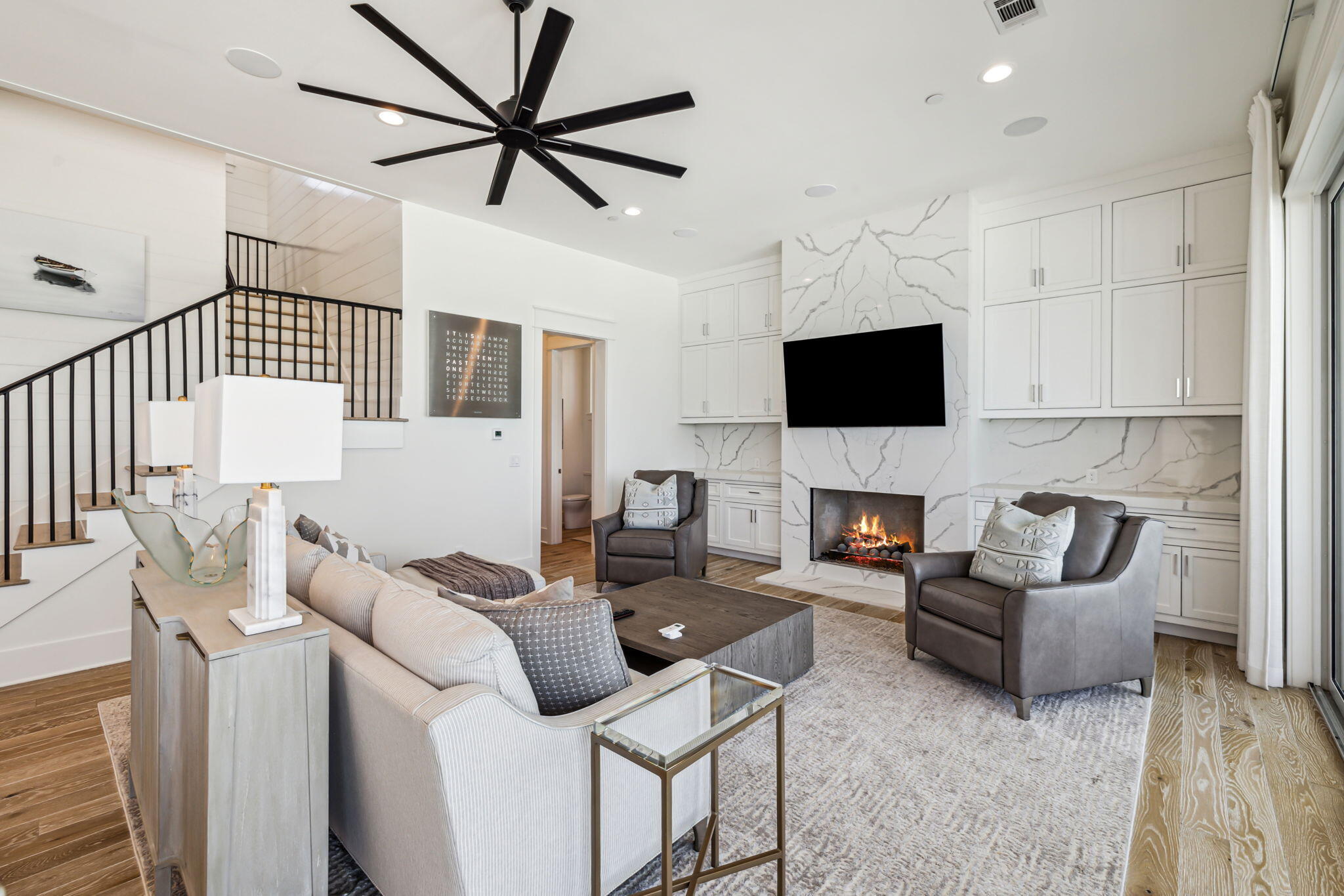 323 Pompano St Inlet Beach Inlet Beach, FL 32461 - Photo 19 of 79 a living room with furniture a fireplace and a flat screen tv