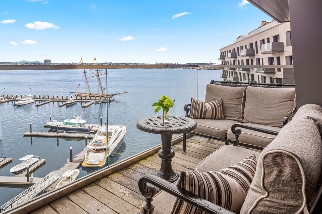 300 Pier 4 Blvd., Unit 8N Boston, MA 02210 - Photo 12 of 37 a view of a balcony with chairs
