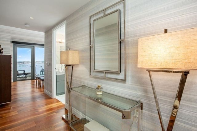 a bathroom with a sink a mirror and a shower