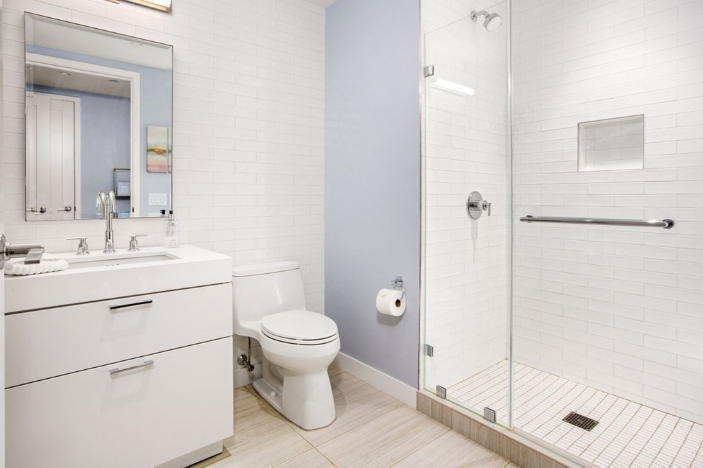 300 Pier 4 Blvd., Unit 8N Boston, MA 02210 - Photo 22 of 37 a bathroom with a sink toilet and shower