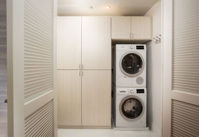a utility room with dryer and washer