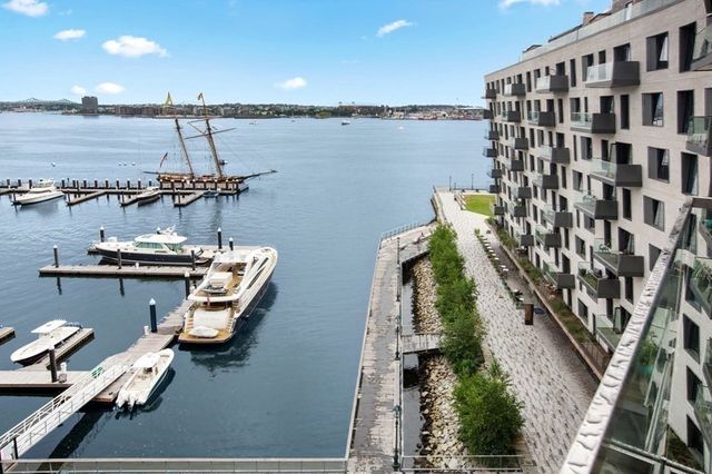 a couple of boats are docked in a harbor