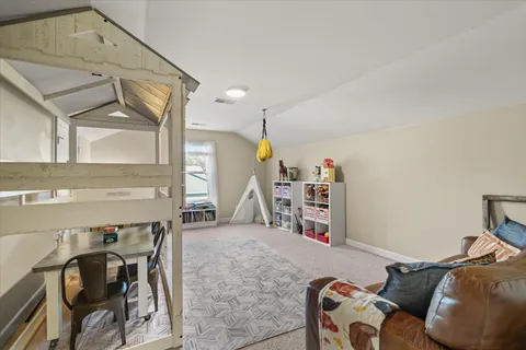 a living room that has a couch and a table in it