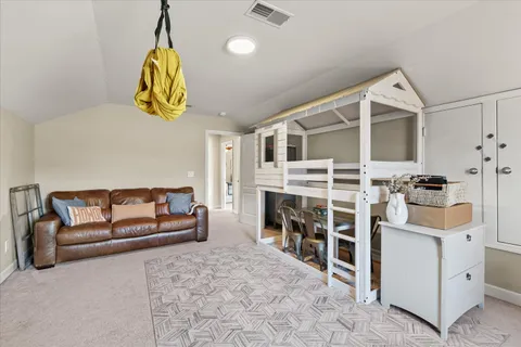 a view of a livingroom with furniture and window