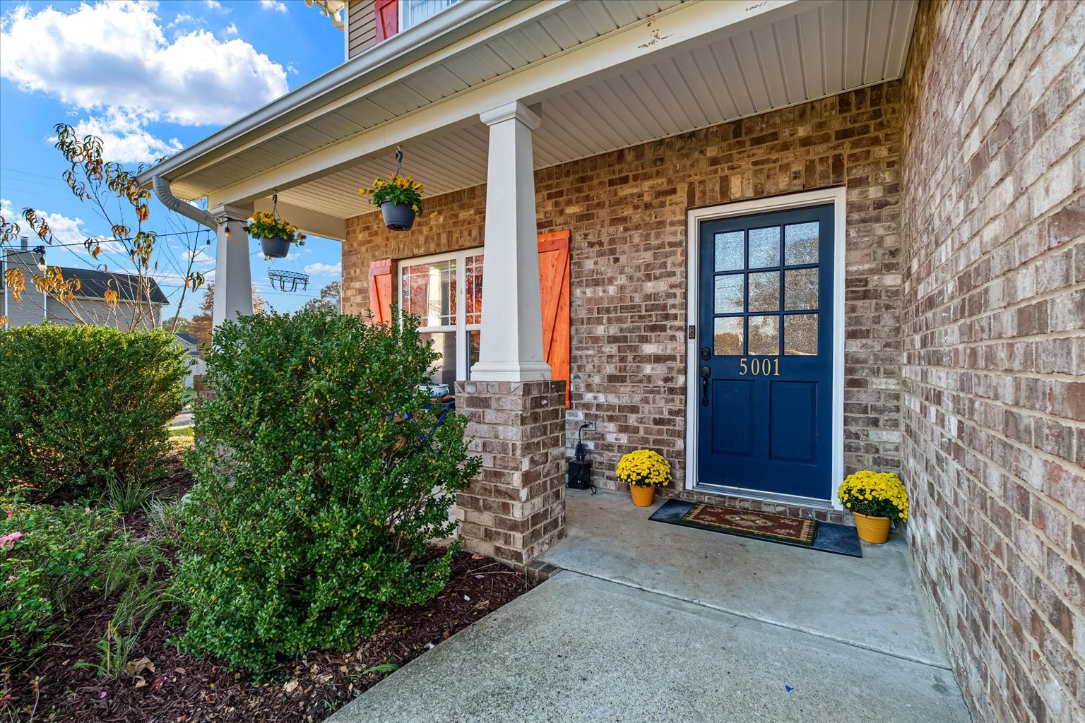 5001 Morning Dove Lane Spring Hill, TN 37174 - Photo 4 of 21 a front view of a house with a garden