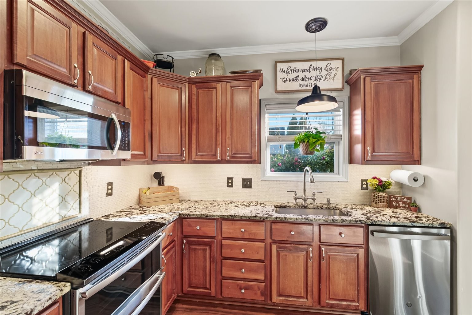 5001 Morning Dove Lane Spring Hill, TN 37174 - Photo 10 of 21 a kitchen with granite countertop a sink stove and cabinets