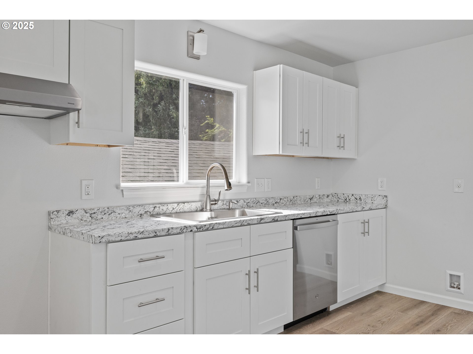 1175 North Dean Street Coquille, OR 97423 - Photo 17 of 34 a kitchen with a sink and cabinets