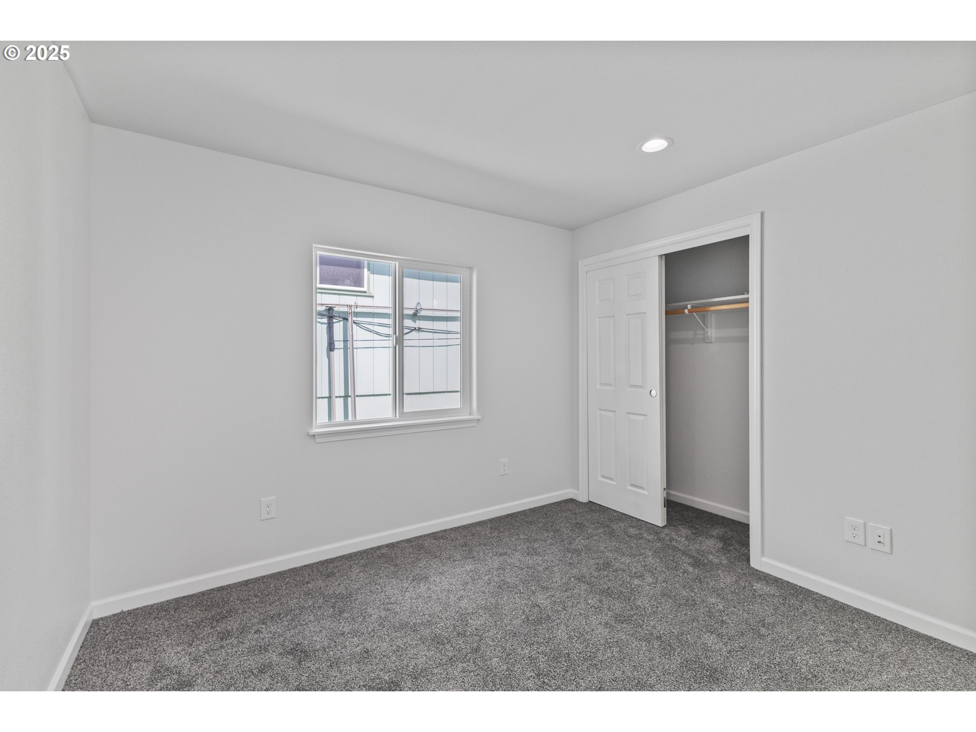 1175 North Dean Street Coquille, OR 97423 - Photo 21 of 34 a view of an empty room with a window