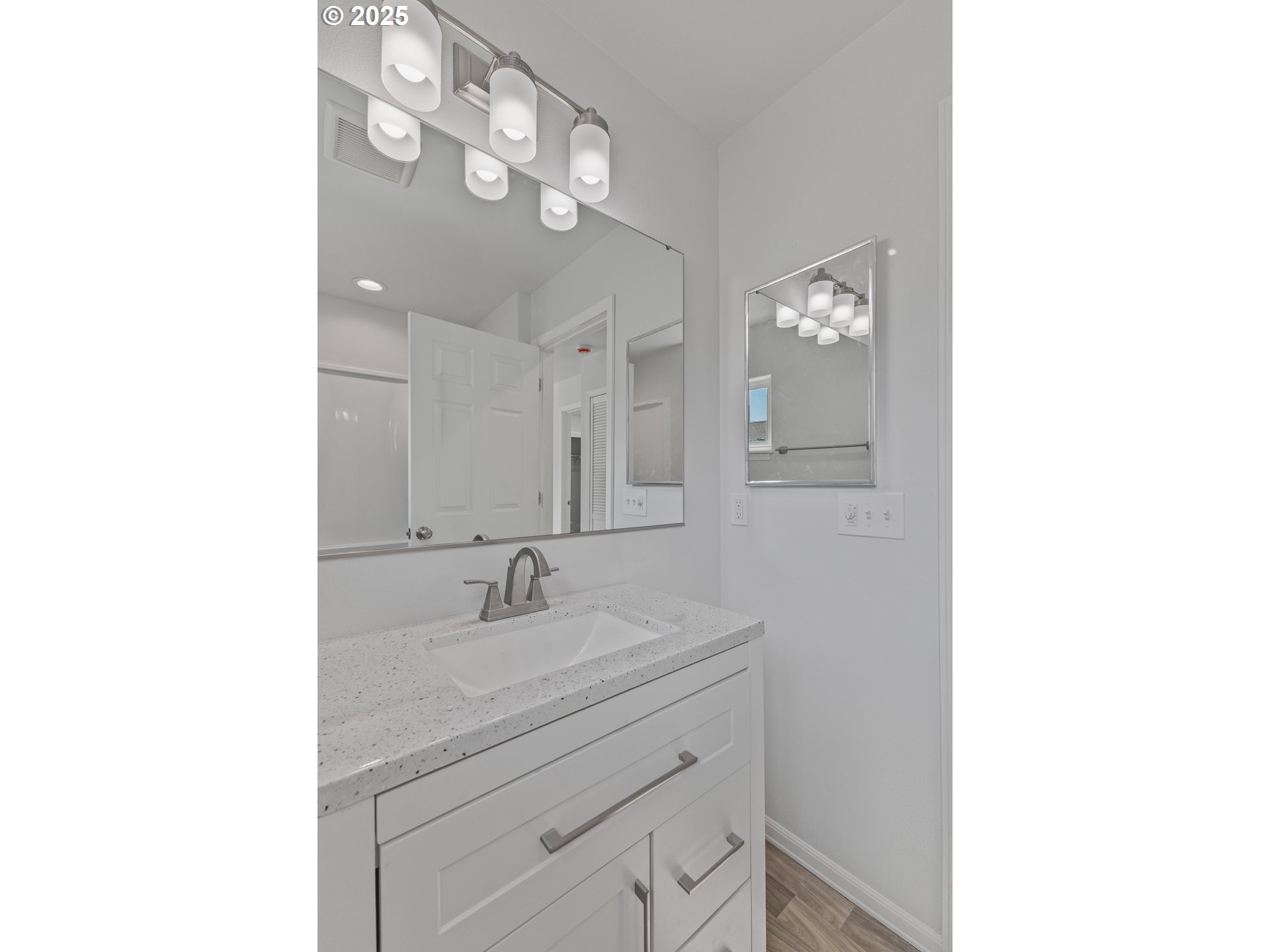 1175 North Dean Street Coquille, OR 97423 - Photo 25 of 34 a bathroom with a sink vanity and a mirror