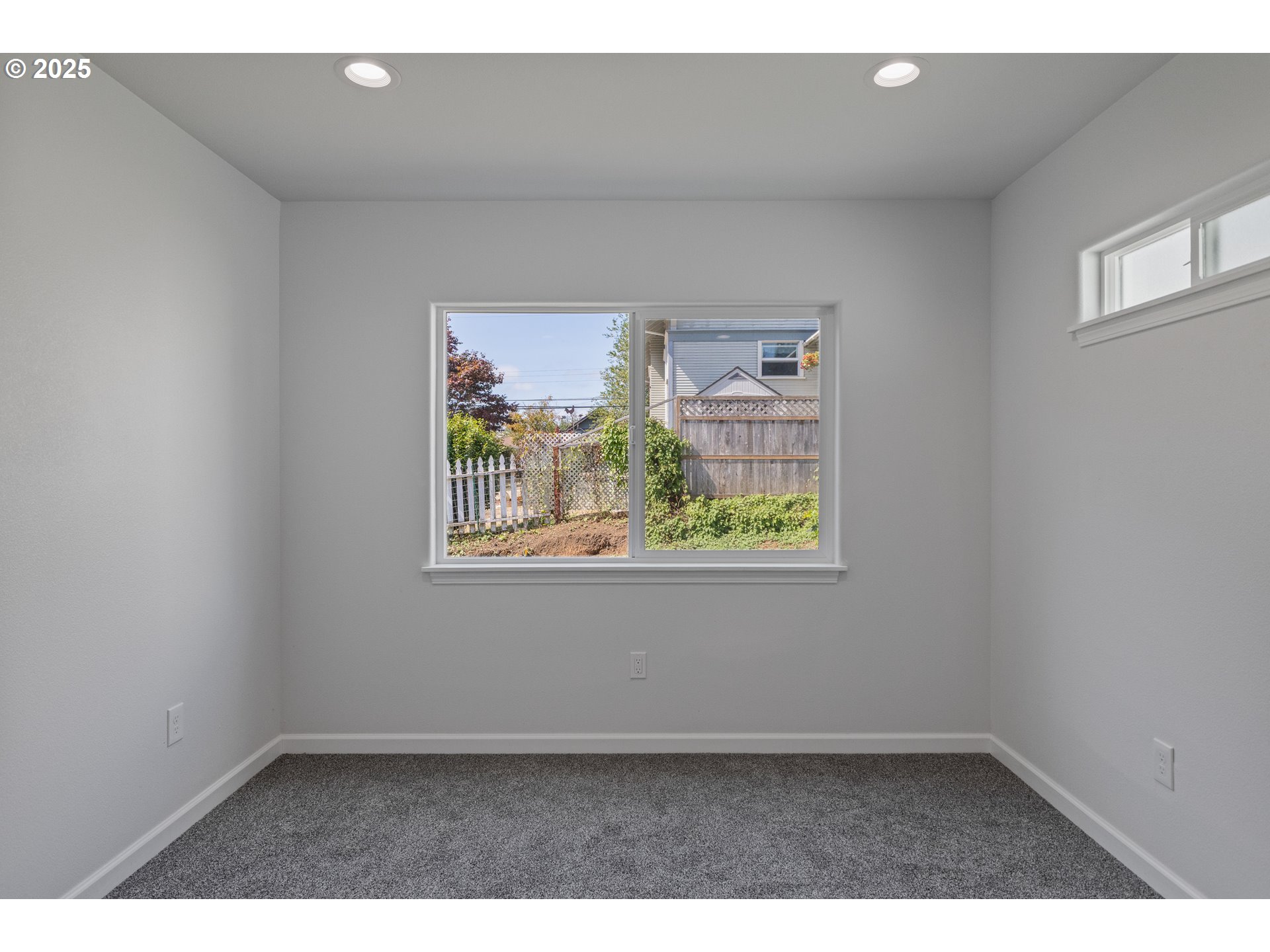 1175 North Dean Street Coquille, OR 97423 - Photo 27 of 34 an empty room with windows and outdoor