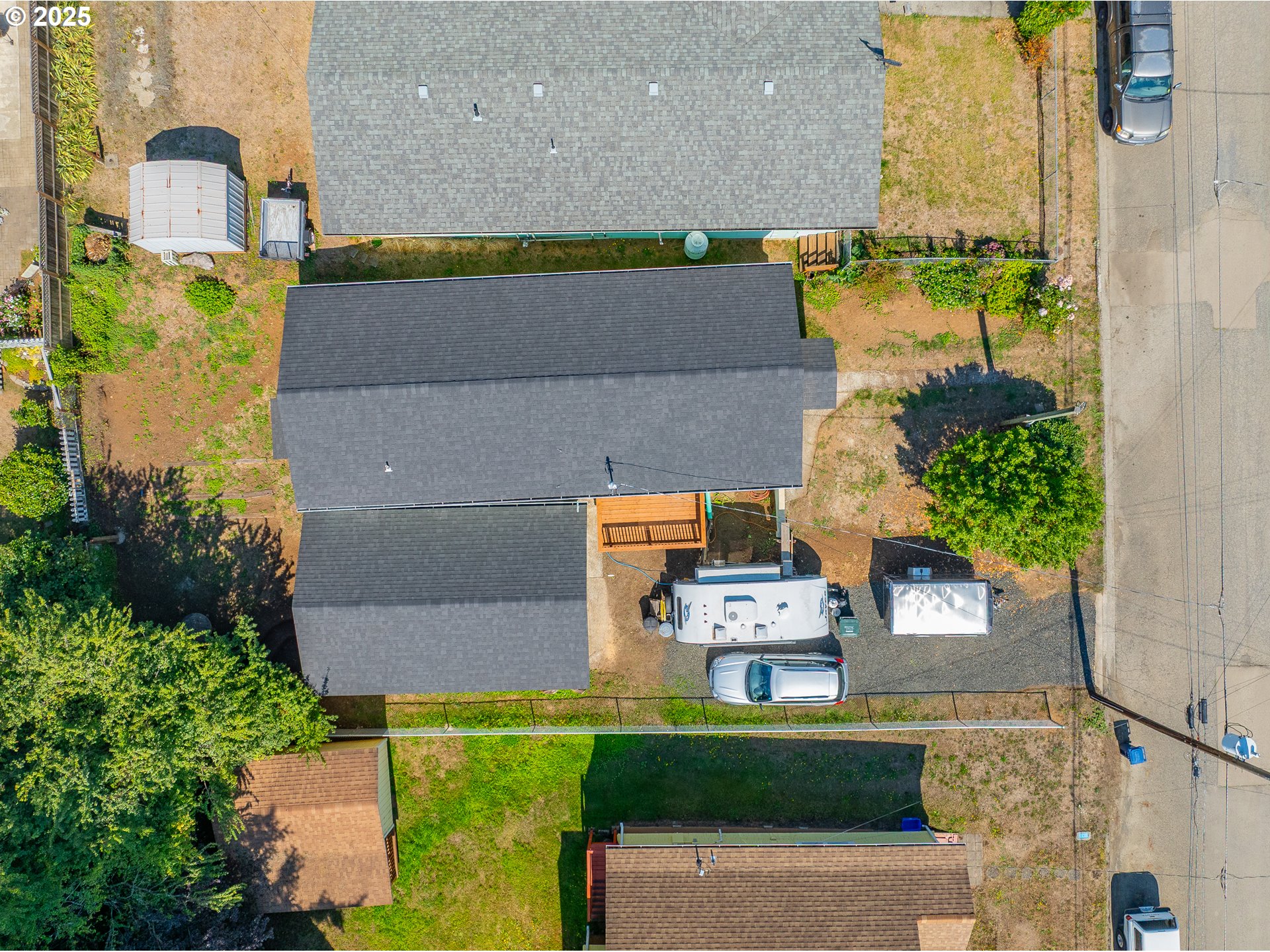 1175 North Dean Street Coquille, OR 97423 - Photo 3 of 34 an aerial view of residential houses with outdoor space and parking