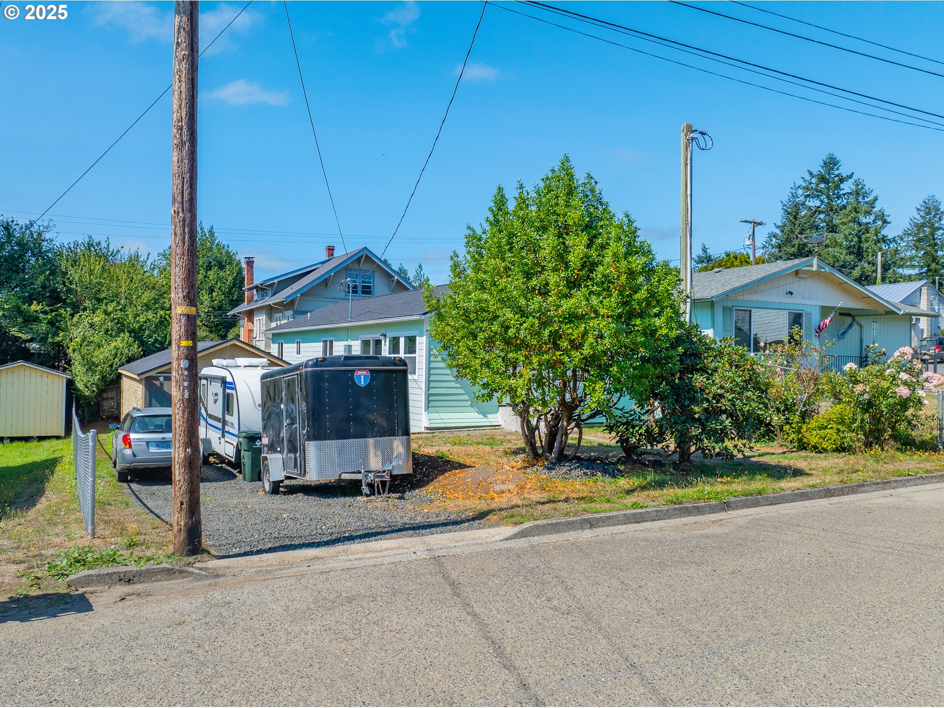 1175 North Dean Street Coquille, OR 97423 - Photo 5 of 34 a front view of a house with a yard
